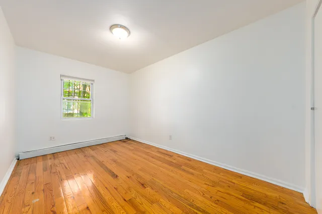 a view of a refrigerator and window