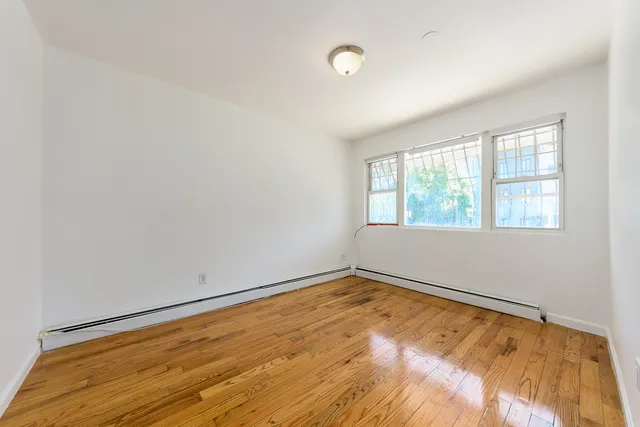 a bathroom with a sink a toilet and a bathtub