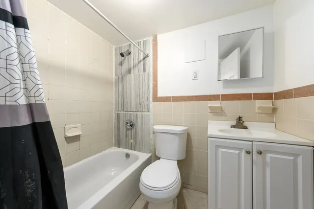 a picture of a rug with a white wall