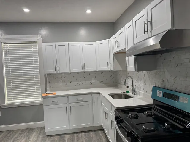 a view of wooden floor and staircase