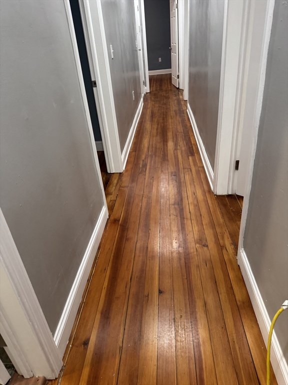 419 Seaver Street, Unit 3 Boston, MA 02121 - Photo 12 of 22 a view of wooden floor and staircase