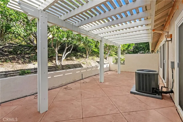 a view of a porch with seating space