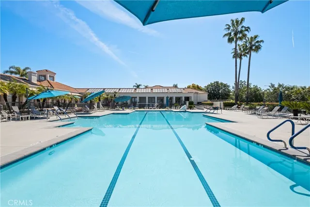 a view of a swimming pool with a patio