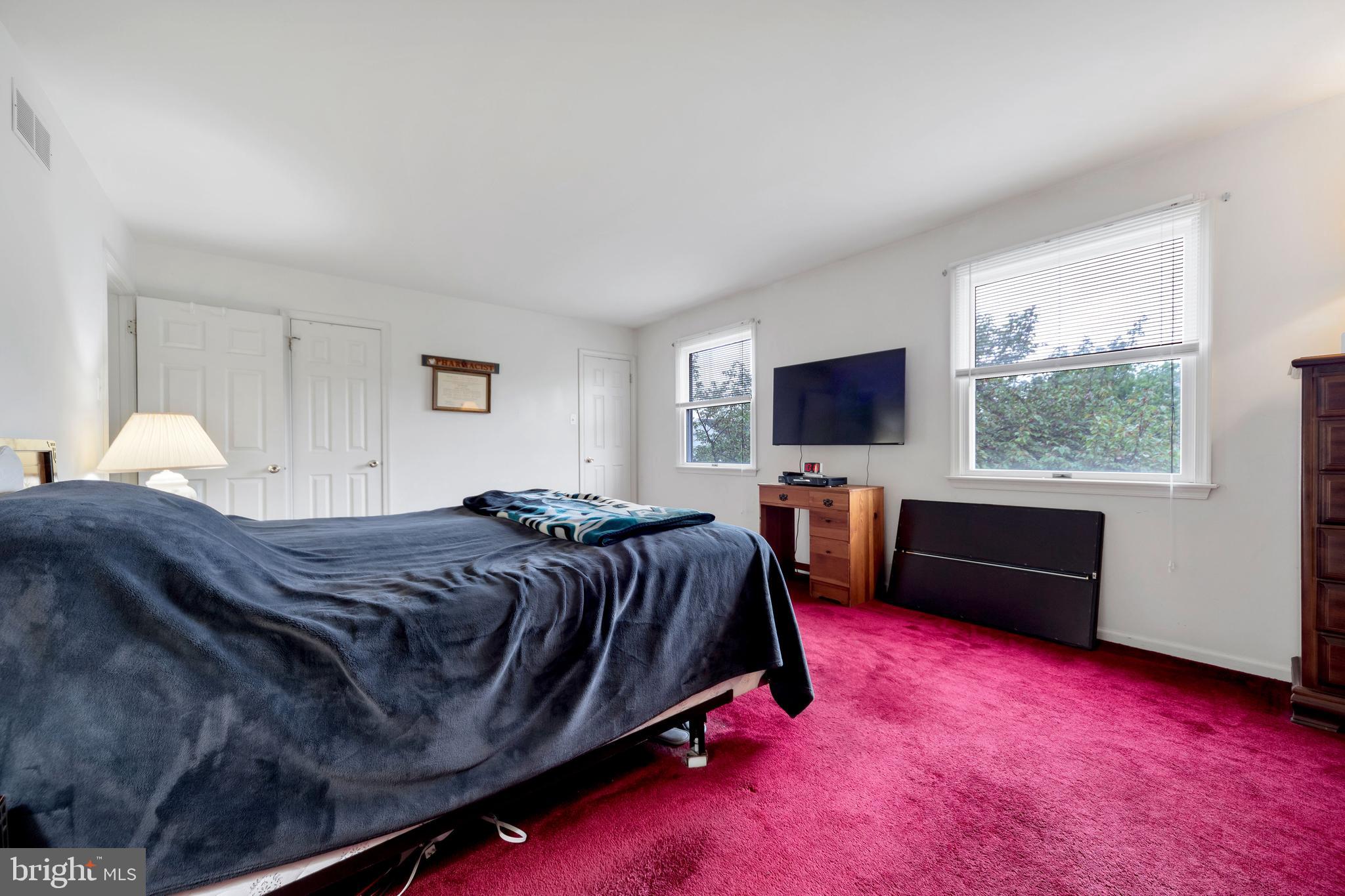 1072 Independence Way Hatfield, PA 19440 - Photo 28 of 37 a spacious bedroom with a bed and a couch