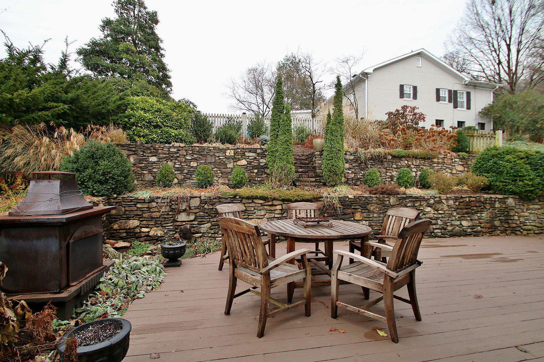 45 Cardinal Road Southwest Roanoke, VA 24014 - Photo 6 of 35 a view of a patio with table and chairs and potted plants