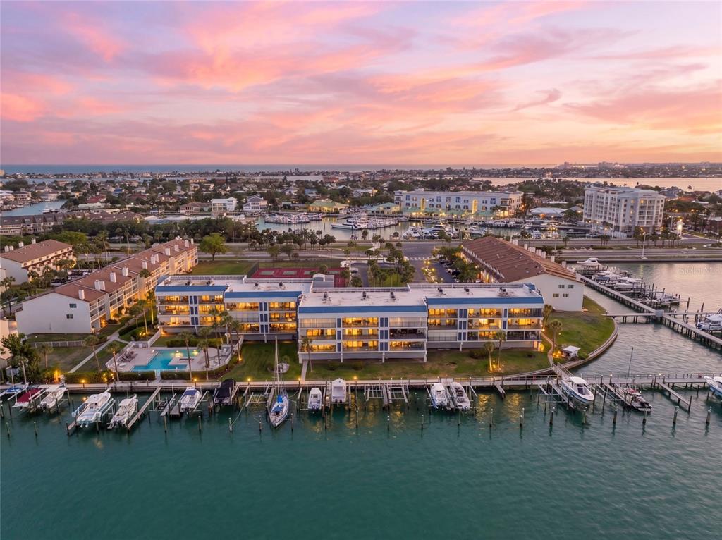 363 Pinellas Bayway South, Unit 29 Tierra Verde, FL 33715 - Photo 3 of 59 an aerial view of a city with lots of residential buildings lake and ocean view