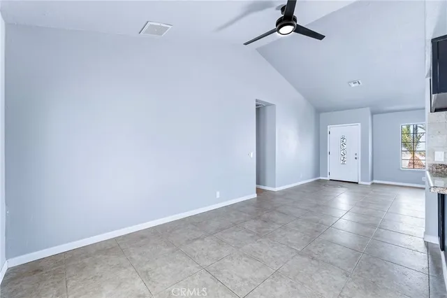 a kitchen with stainless steel appliances granite countertop a stove and a sink