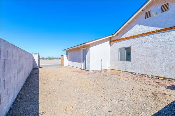 a view of room with air conditioner and windows