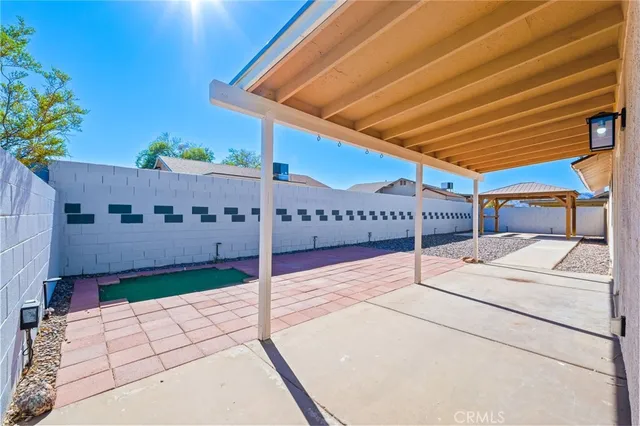 an aerial view of a house with a outdoor space