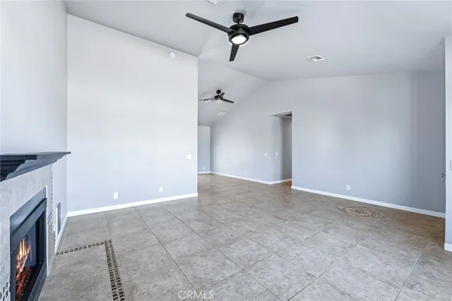 a view of a backyard with potted plants