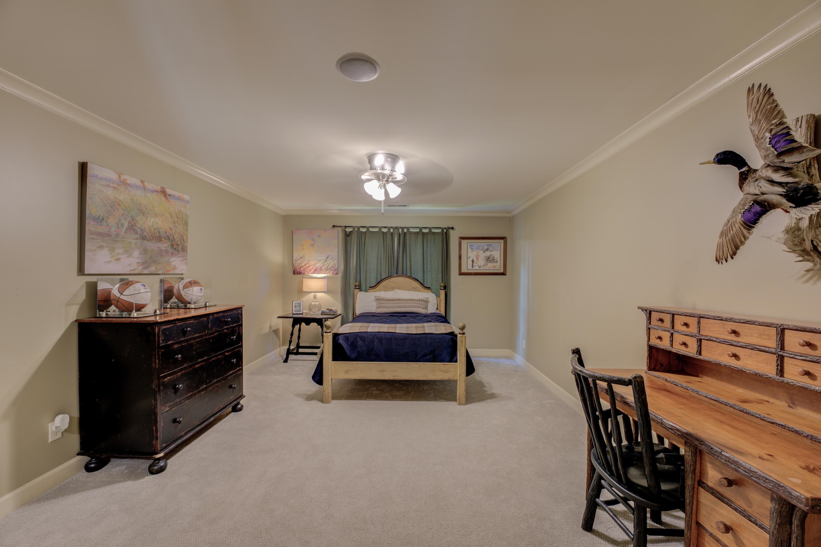 5074 Shady Grove Road Memphis, TN 38117 - Photo 17 of 25 Soft, neutral hues adorn the walls, creating a serene ambiance that promotes rest and relaxation. Discover the joy of true serenity within the walls of this remarkable space.