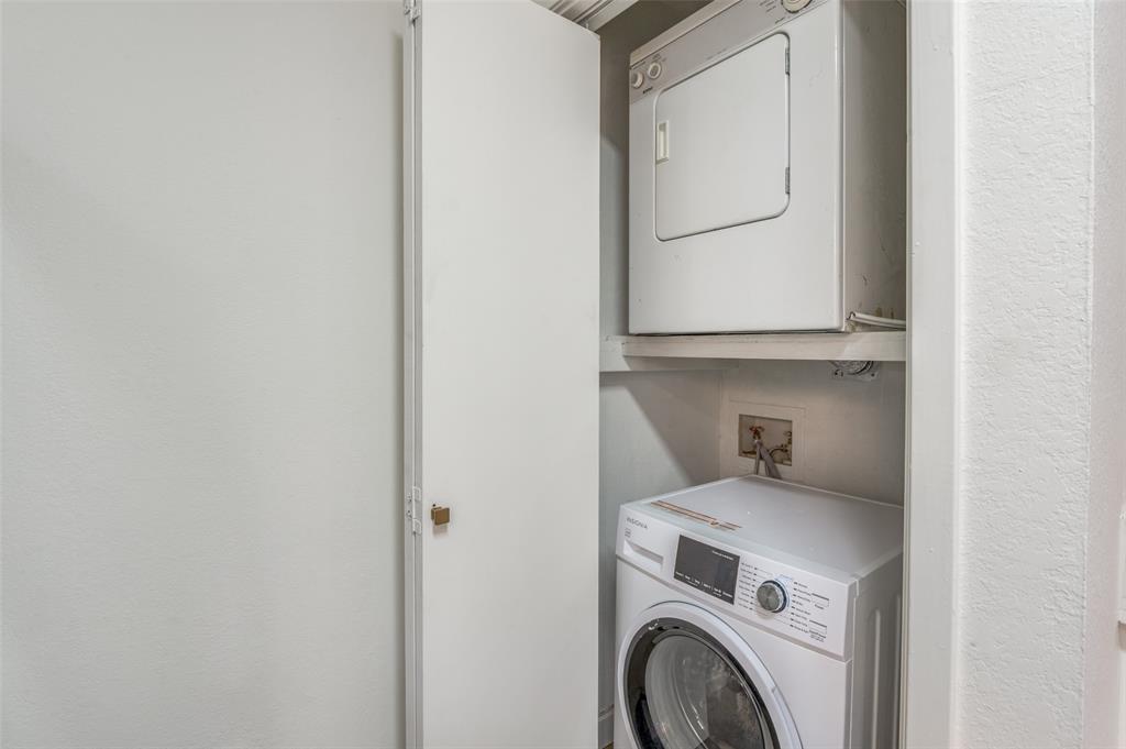 5550 Spring Valley Road, Unit D31 Dallas, TX 75254 - Photo 12 of 19 a utility room with dryer and washer
