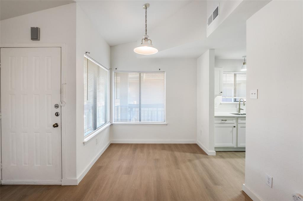 5550 Spring Valley Road, Unit D31 Dallas, TX 75254 - Photo 2 of 19 a view of an empty room with a window
