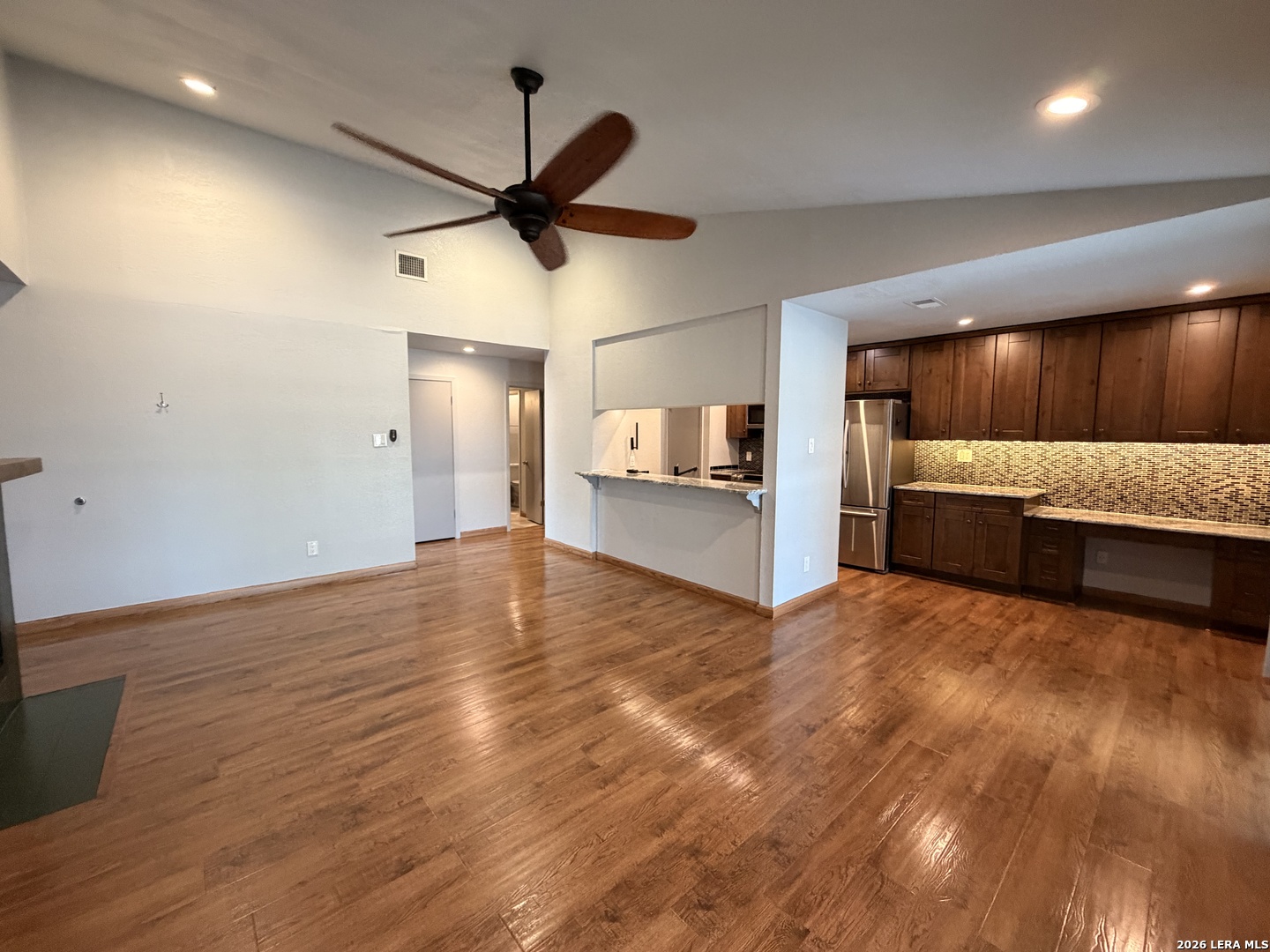 14343 Judson Road, Unit 302 San Antonio, TX 78233 - Photo 1 of 14 a view of a kitchen with a sink and a stove top oven