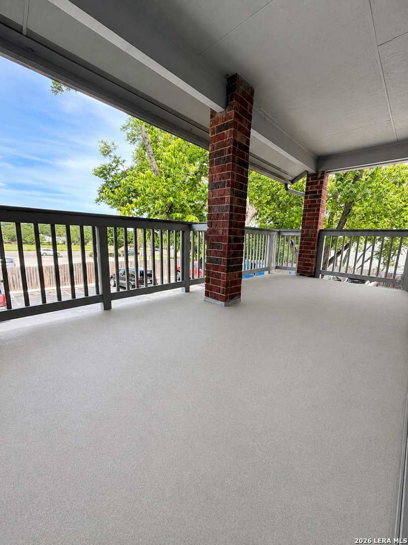 14343 Judson Road, Unit 302 San Antonio, TX 78233 - Photo 6 of 14 a view of an empty room with a balcony