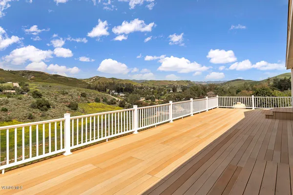 a view of a balcony with a swing