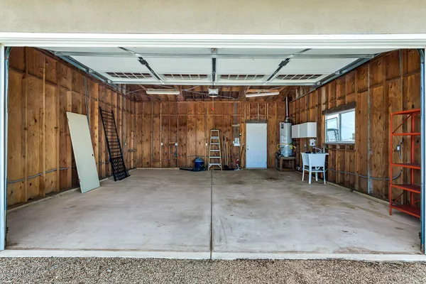a view of a room with wooden walls