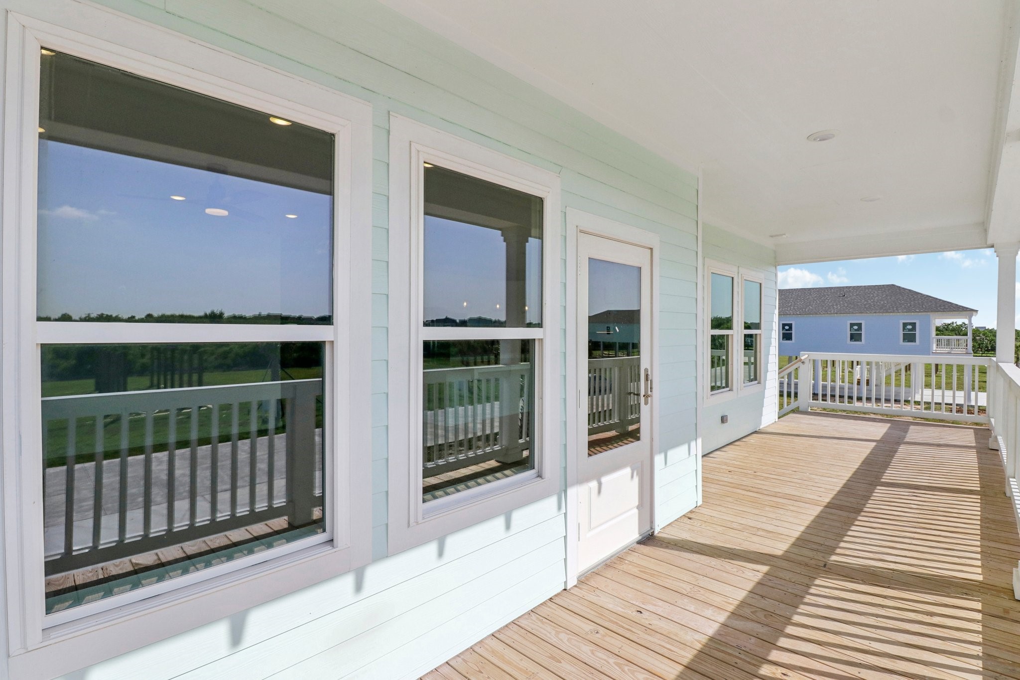 1326 Sapphire Palms Court San Leon, TX 77539 - Photo 5 of 20 a view of a balcony with wooden floor