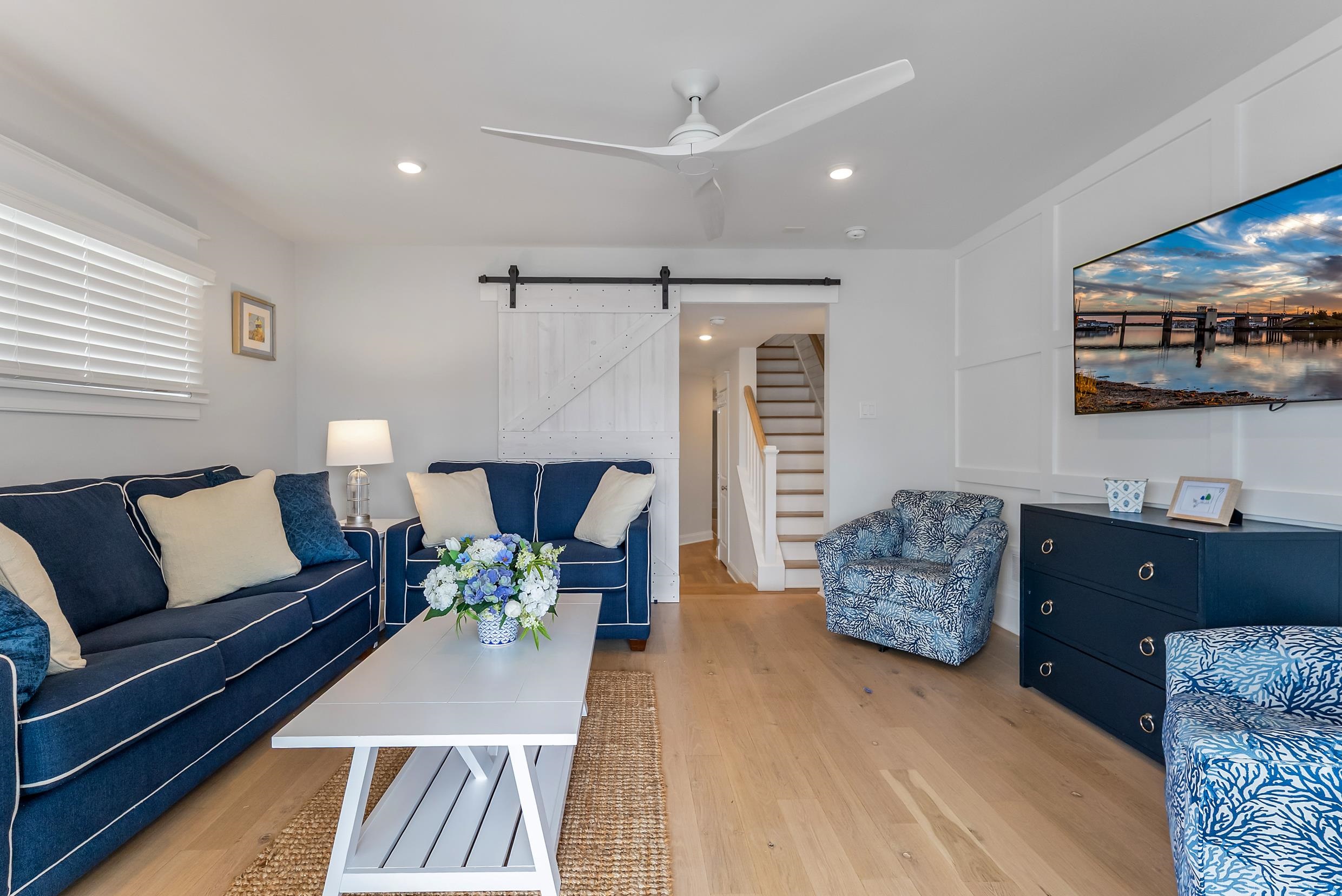 253 35th, Unit WEST Avalon, NJ 08202 - Photo 14 of 43 a living room with furniture and wooden floor
