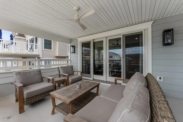a kitchen with stainless steel appliances kitchen island granite countertop a sink and cabinets