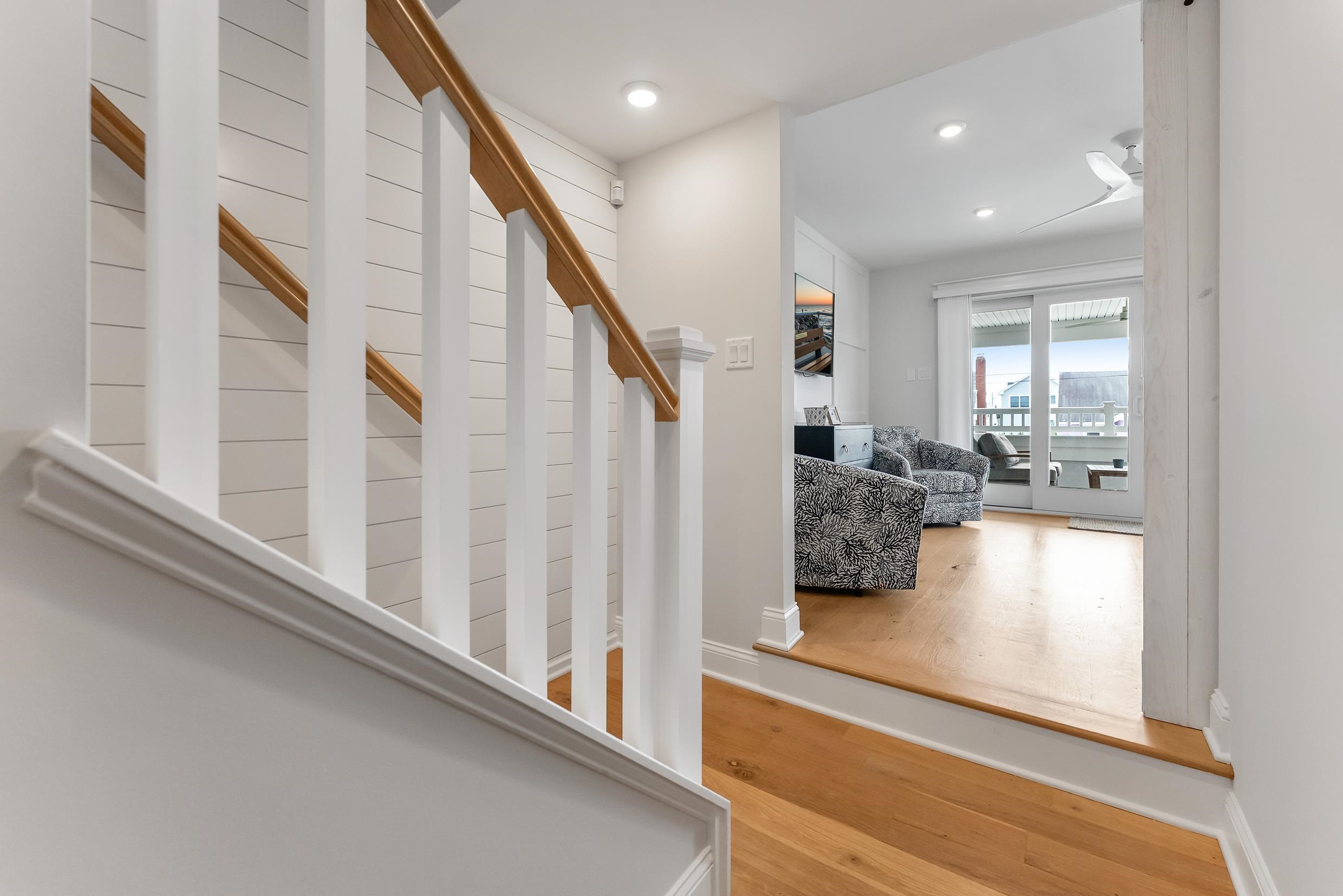 253 35th, Unit WEST Avalon, NJ 08202 - Photo 17 of 43 a view of entryway and hall with wooden floor