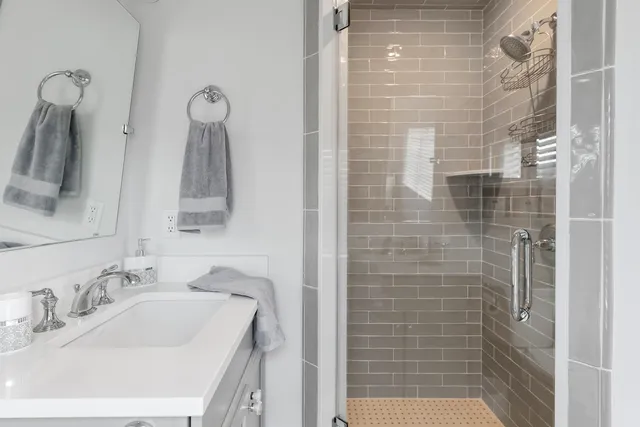 a bed room with a bed and a window