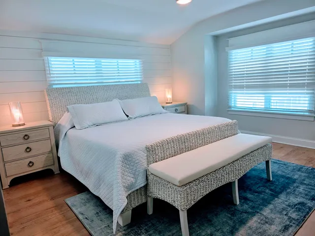 a bathroom with a shower sink vanity and mirror