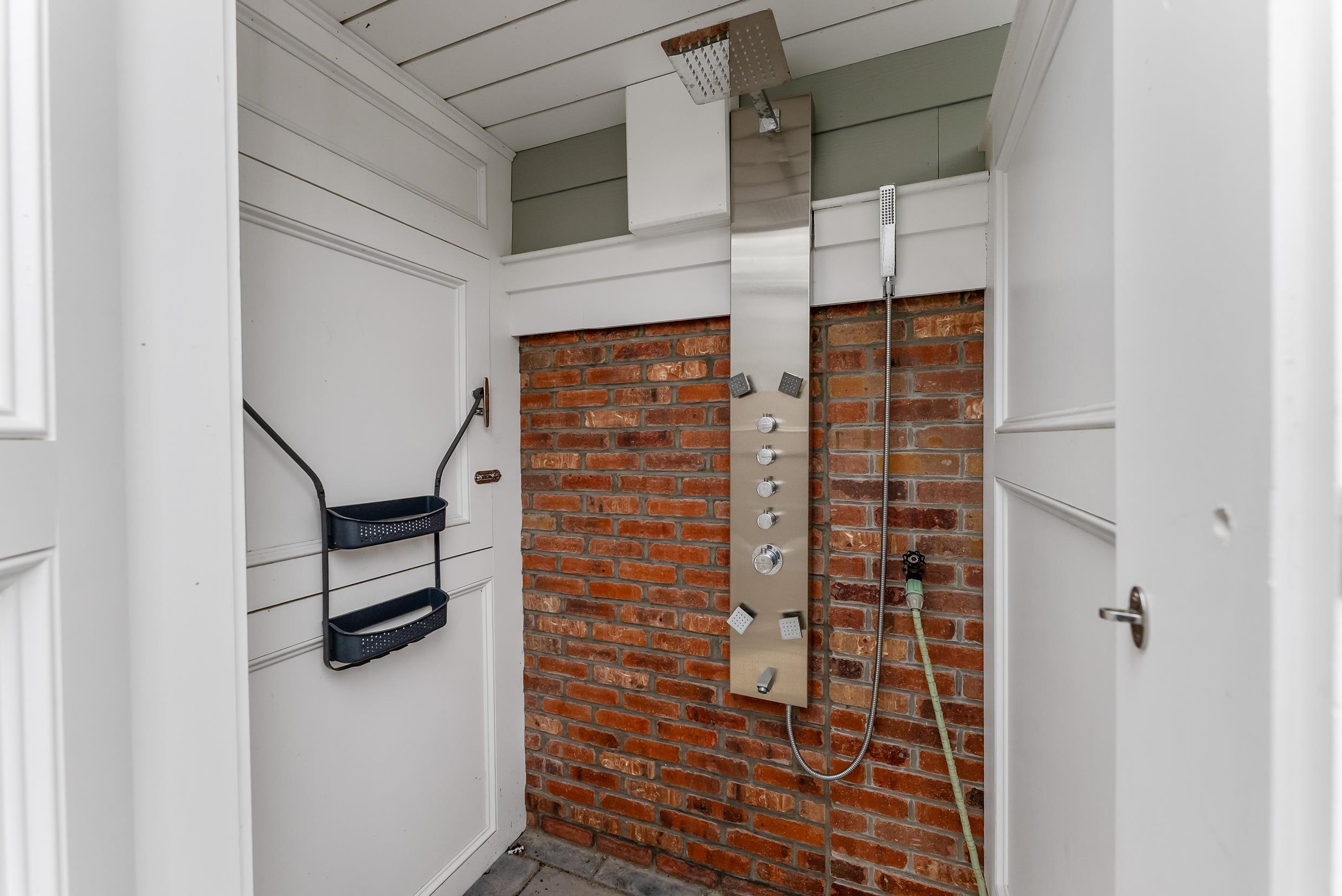 253 35th, Unit WEST Avalon, NJ 08202 - Photo 43 of 43 a bathroom with a shower and a sink