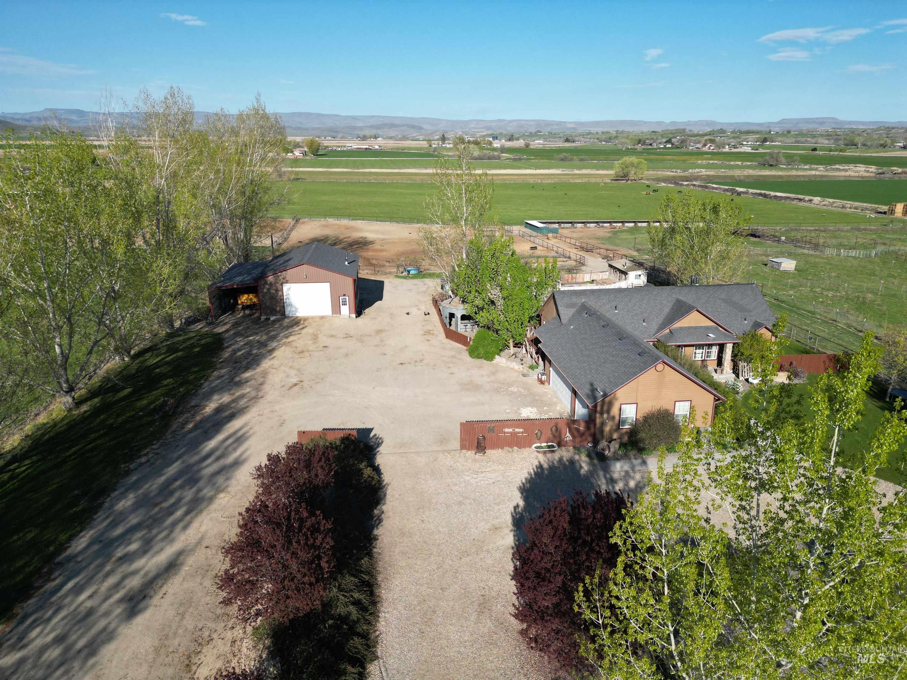 4243 Homestead Road Homedale, ID 83628 - Photo 6 of 50 Aerial view of sparsely populated area with mountains