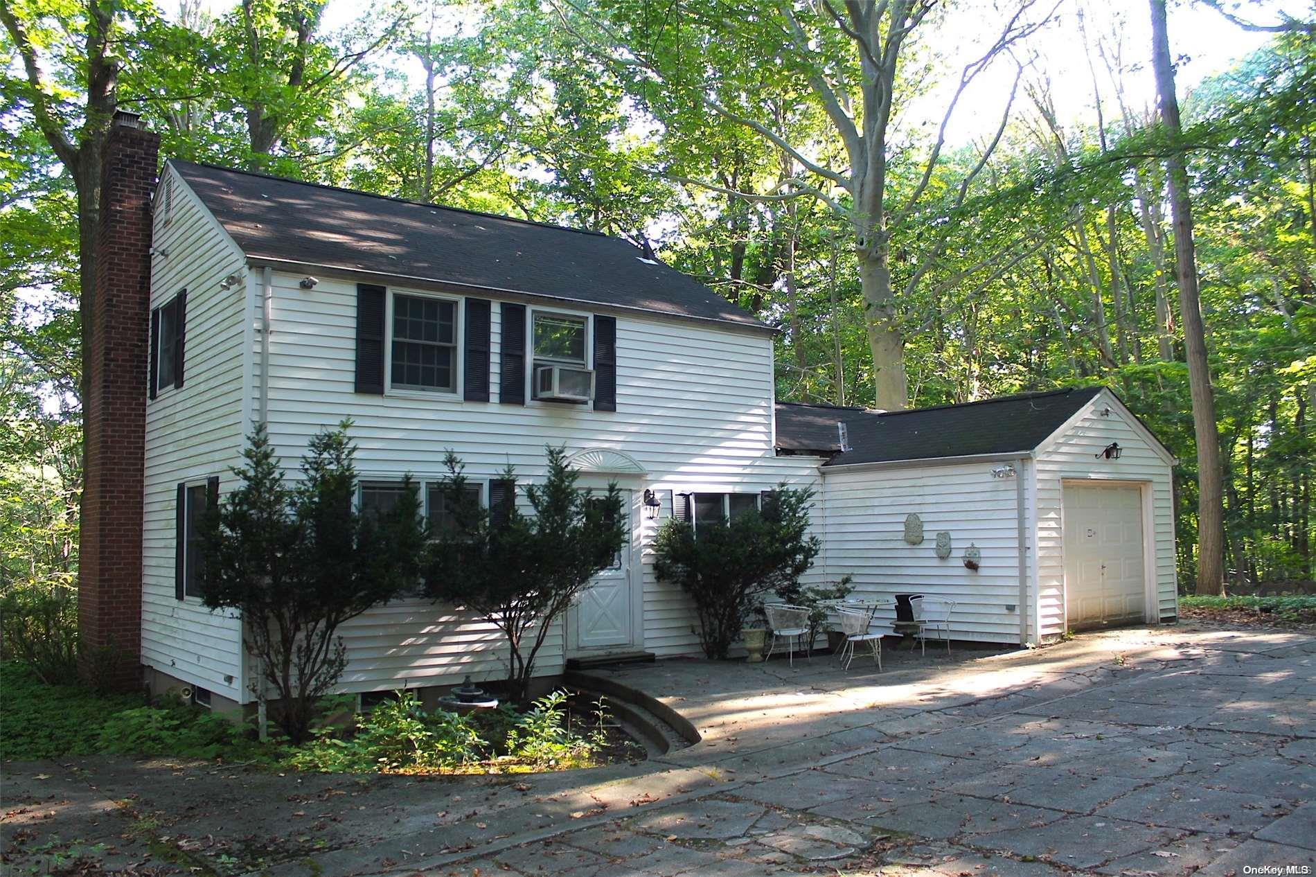 9 Spring Hollow Road Nissequogue, NY 11780 - Photo 1 of 1 BACK OF HOUSE