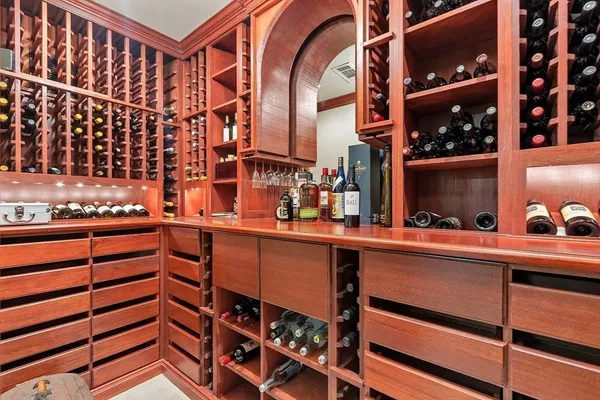 a bedroom with a bed and a cabinets