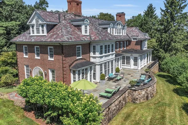 a backyard of a house with lots of green space
