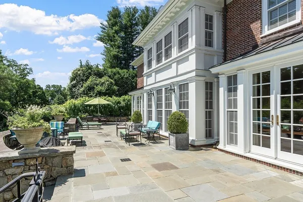 a view of pool with outdoor seating