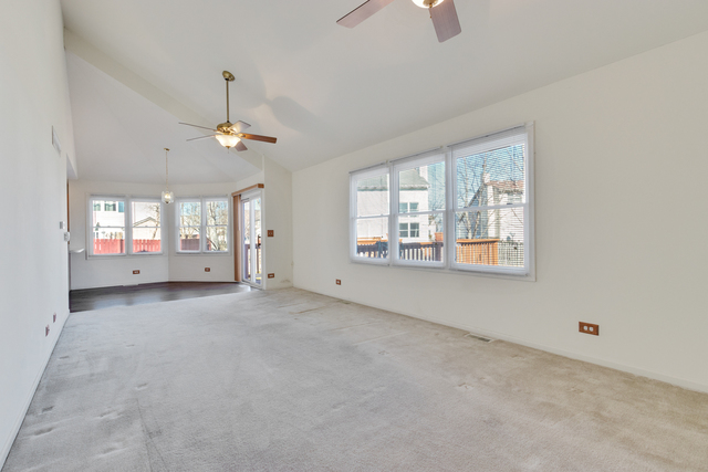 1822 Olde Mill Road Plainfield, IL 60586 - Photo 23 of 29 a view of an empty room with a window