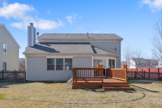 1822 Olde Mill Road Plainfield, IL 60586 - Photo 26 of 29 a view of a house with a balcony