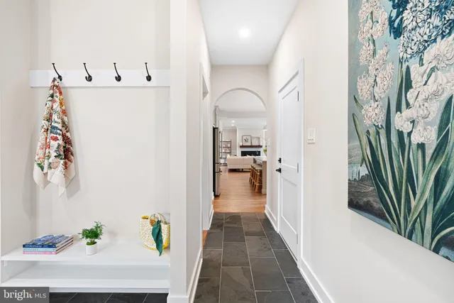 a bathroom with a sink vanity and a mirror