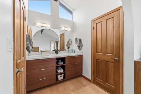 a bathroom with a shower and a toilet