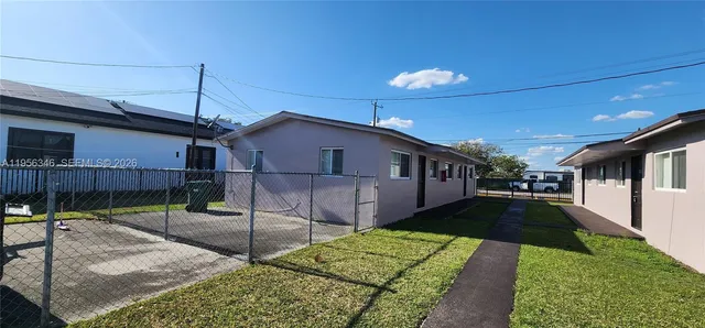 a view of a porch in front of house
