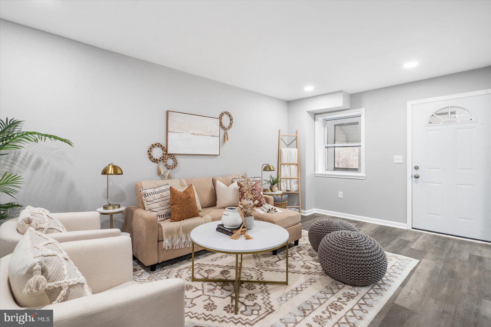 512 Meadow Road Baltimore, MD 21206 - Photo 5 of 41 a living room with furniture and a rug