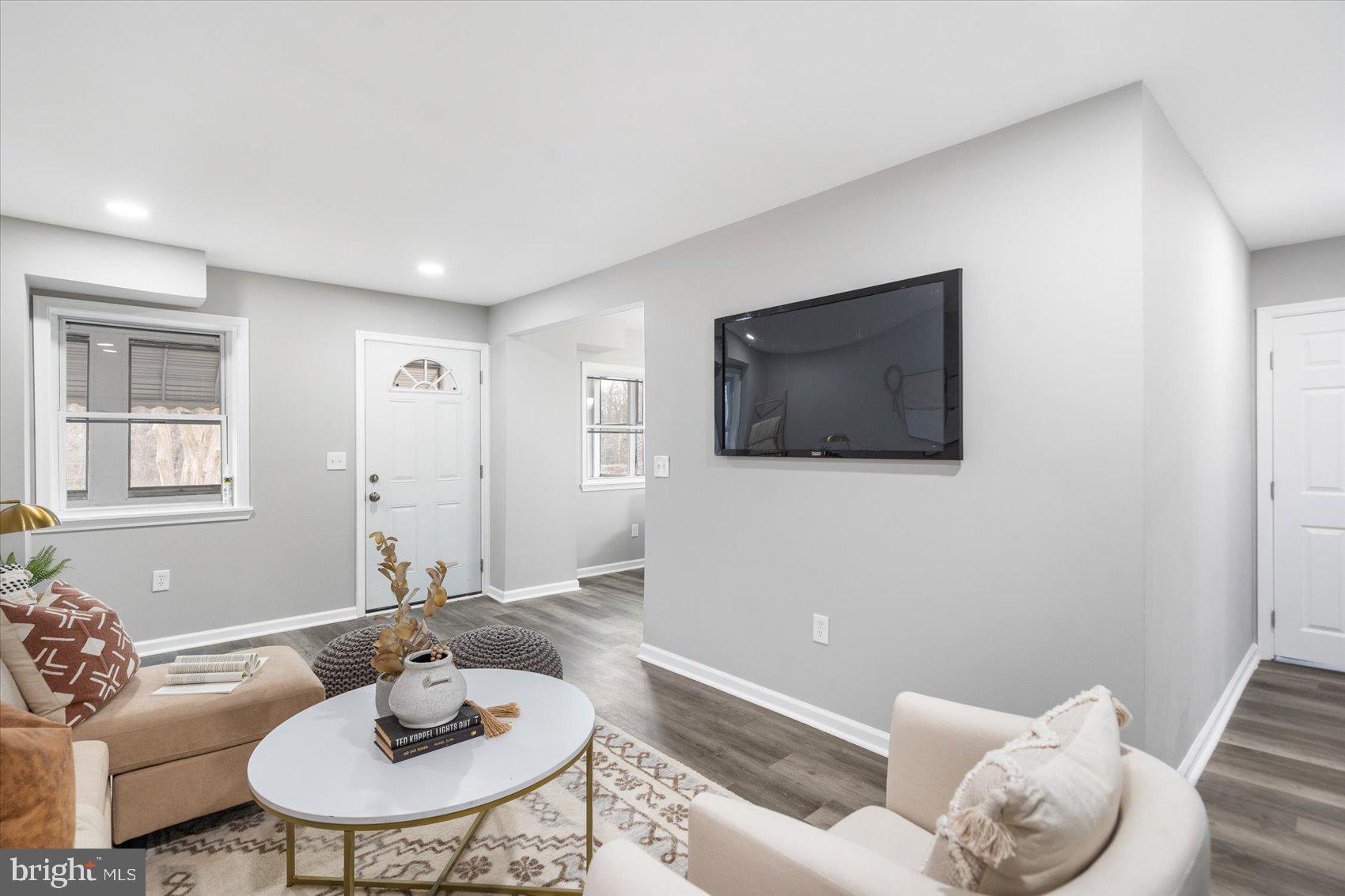 512 Meadow Road Baltimore, MD 21206 - Photo 8 of 41 a living room with furniture and a flat screen tv