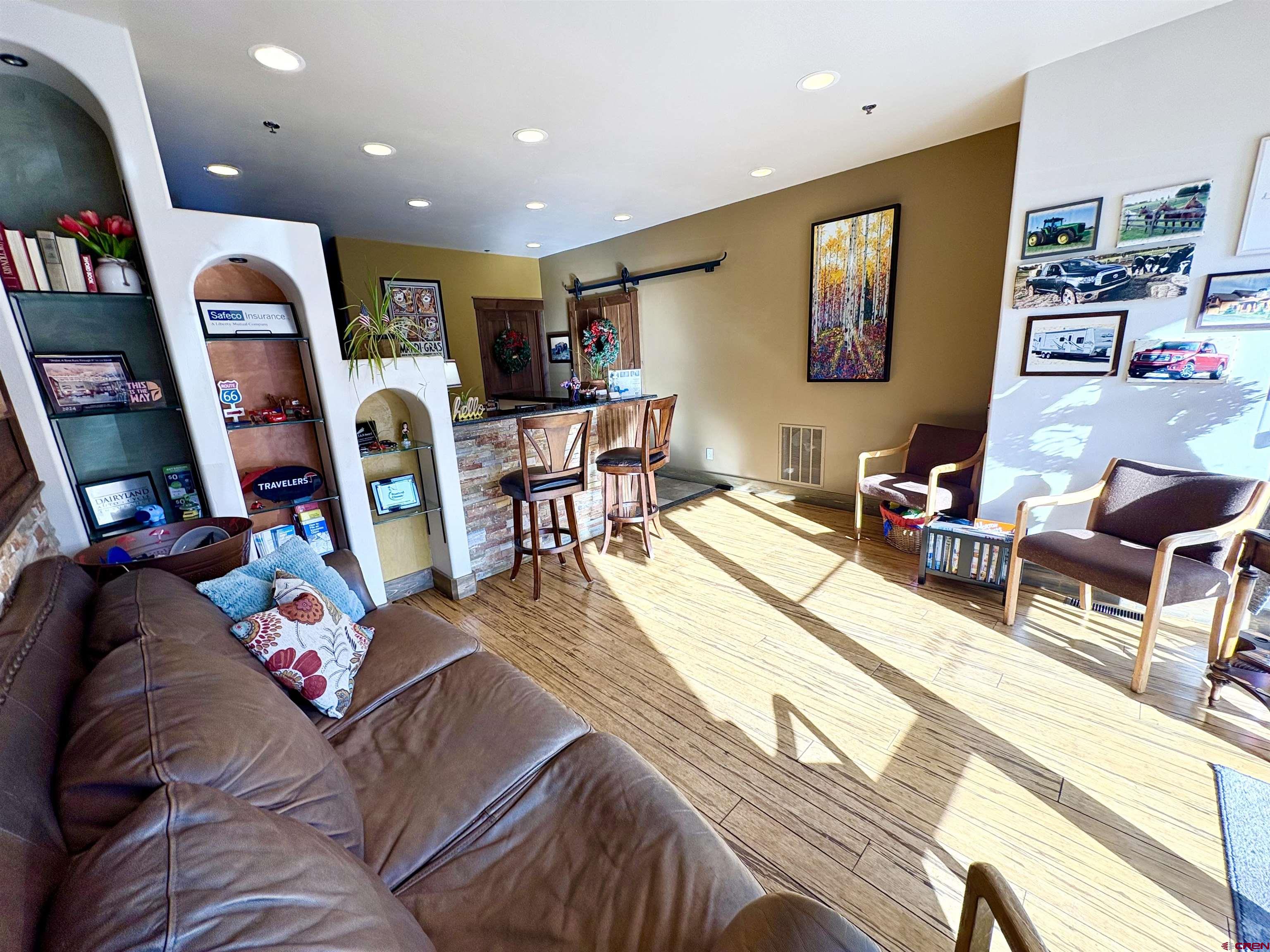 2855 Main Avenue, Unit 106B Durango, CO 81301 - Photo 13 of 18 a living room with furniture and a flat screen tv with rug