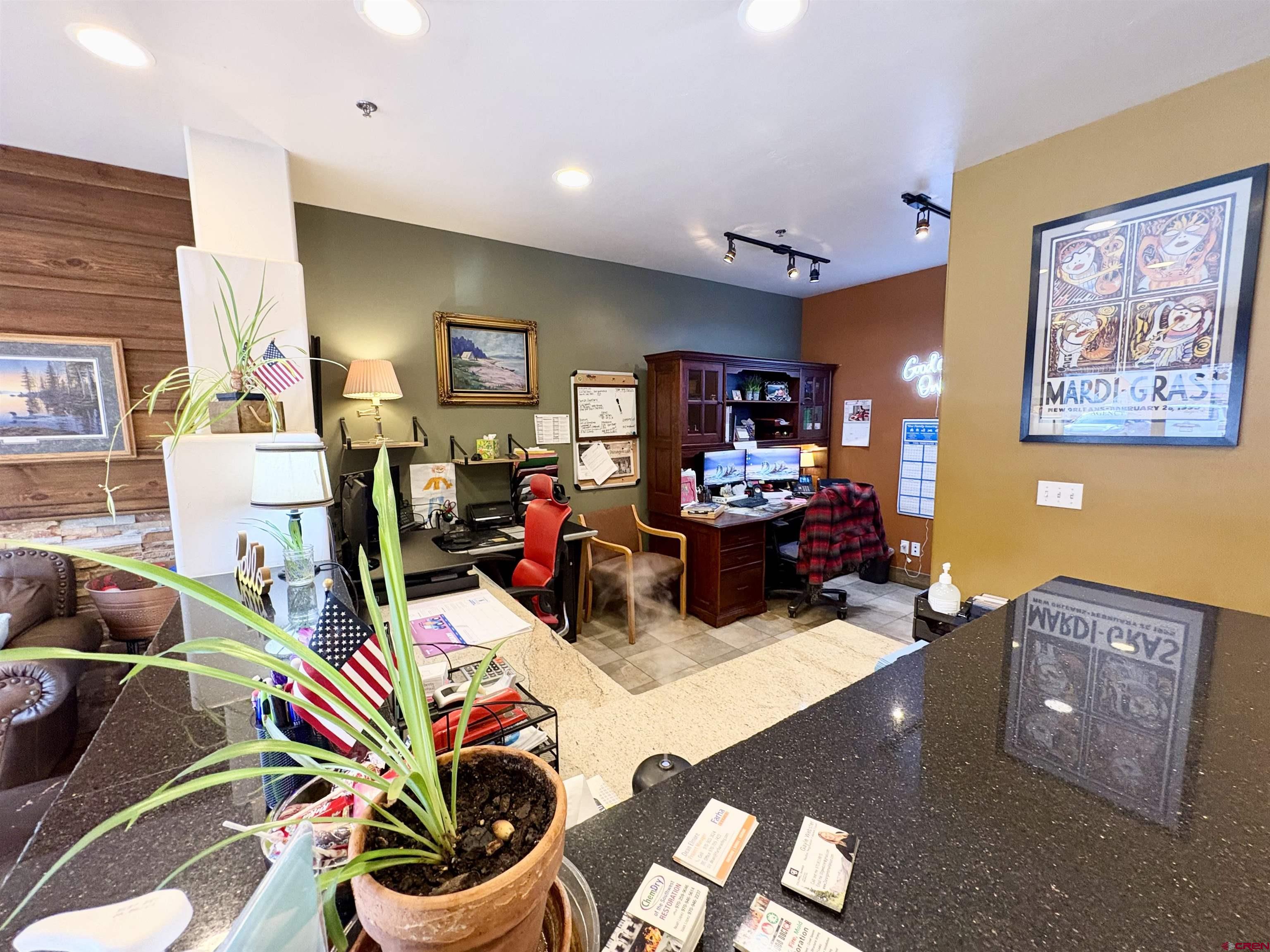 2855 Main Avenue, Unit 106B Durango, CO 81301 - Photo 8 of 18 a living room with furniture and a flat screen tv