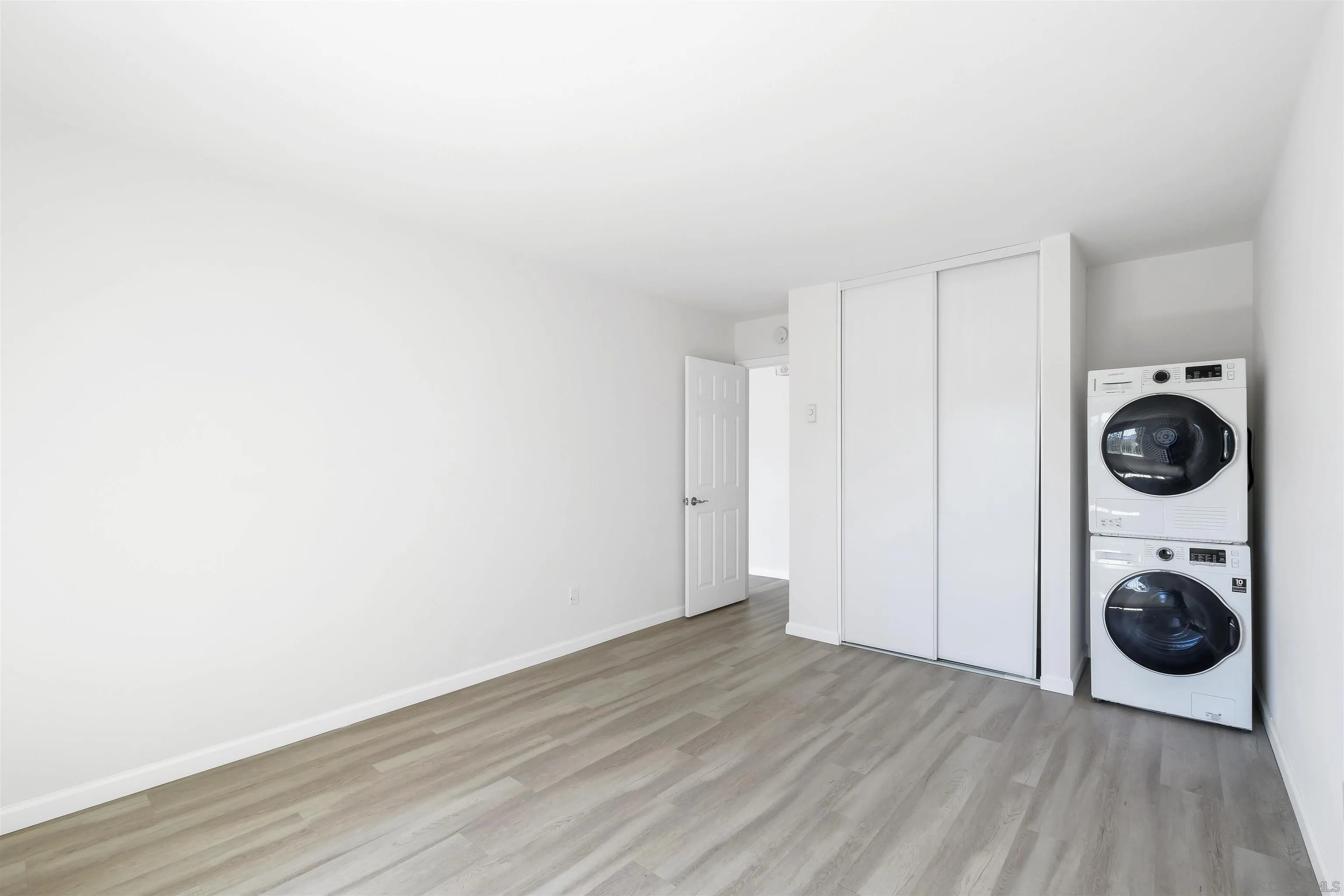 3827 Conrad Drive Spring Valley, CA 91977 - Photo 6 of 9 a view of washer and dryer in a room