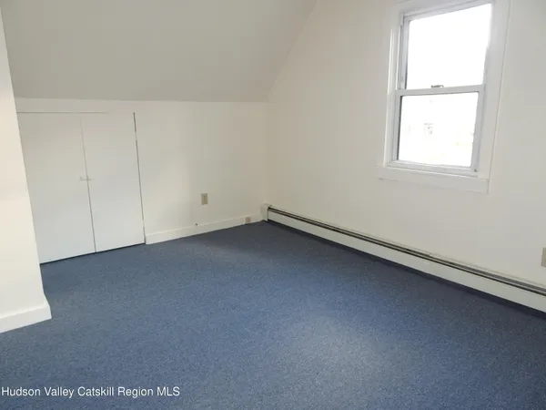 an empty room with closet