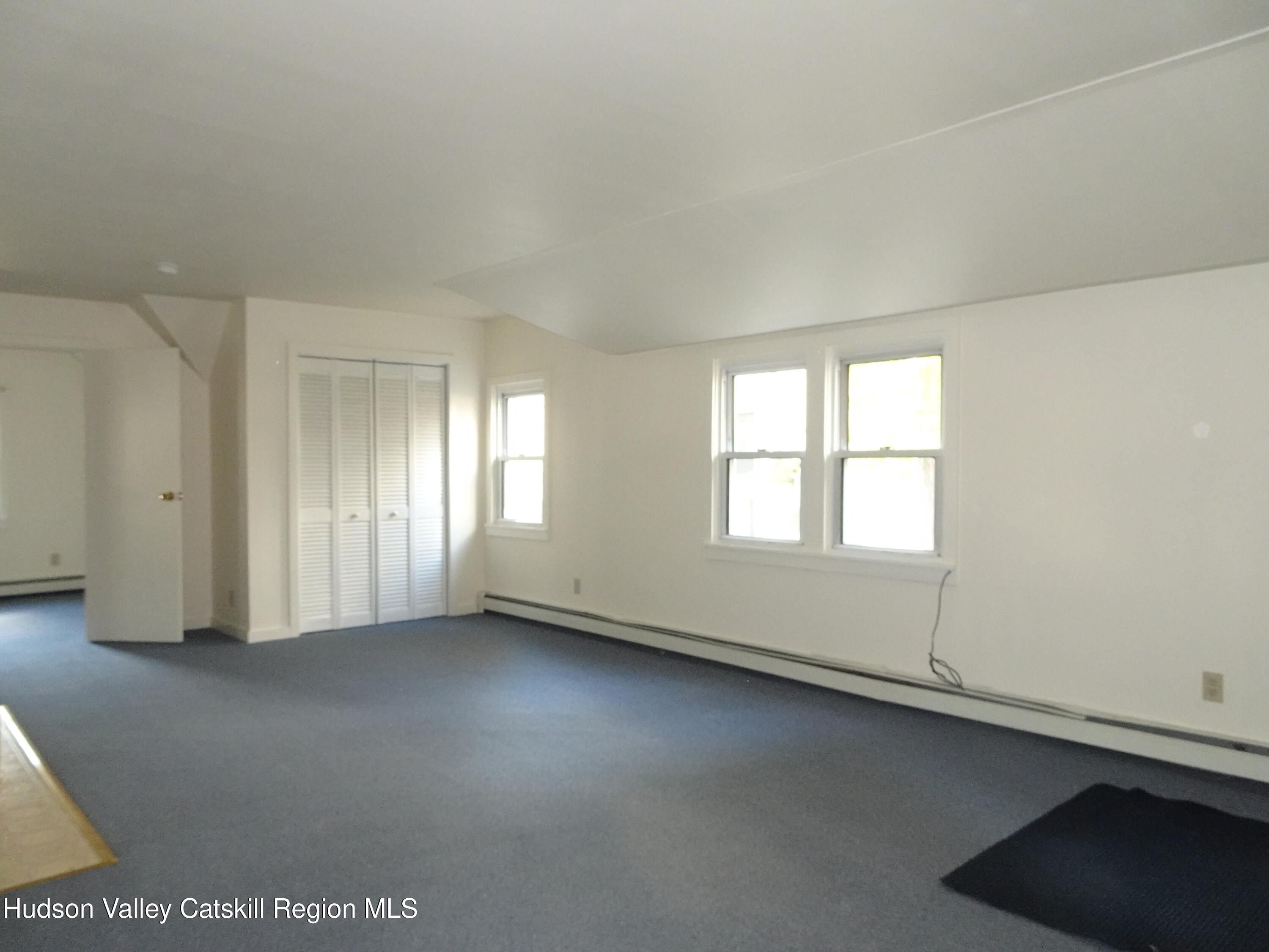 5 Old Lane, Unit MEWS A Claverack, NY 12534 - Photo 7 of 19 an empty room with a window