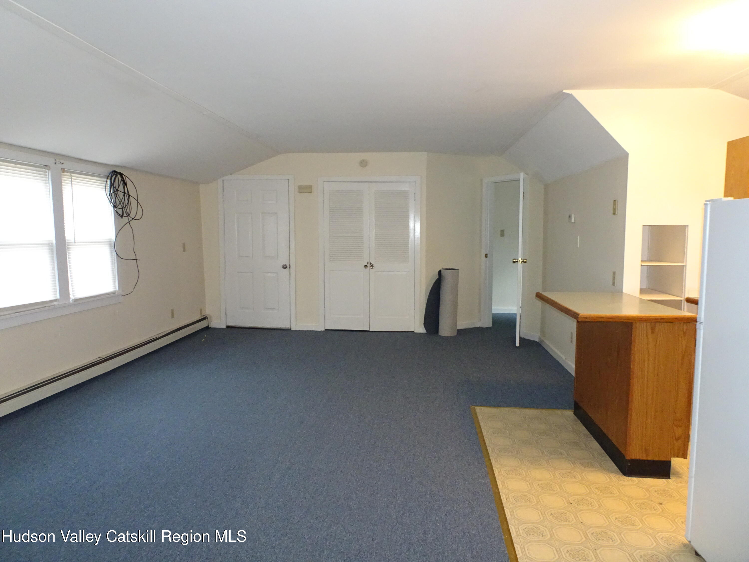 5 Old Lane, Unit MEWS A Claverack, NY 12534 - Photo 9 of 19 a view of an empty room with a window