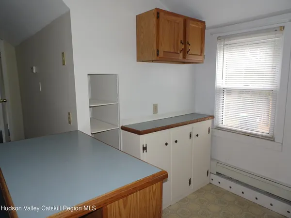a kitchen with a stove and a microwave