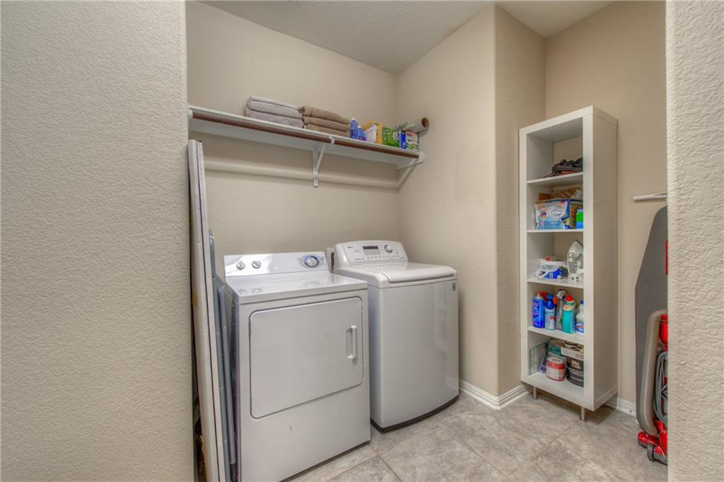 1511 Rimstone Drive Cedar Park, TX 78613 - Photo 16 of 40 a utility room with dryer and washer