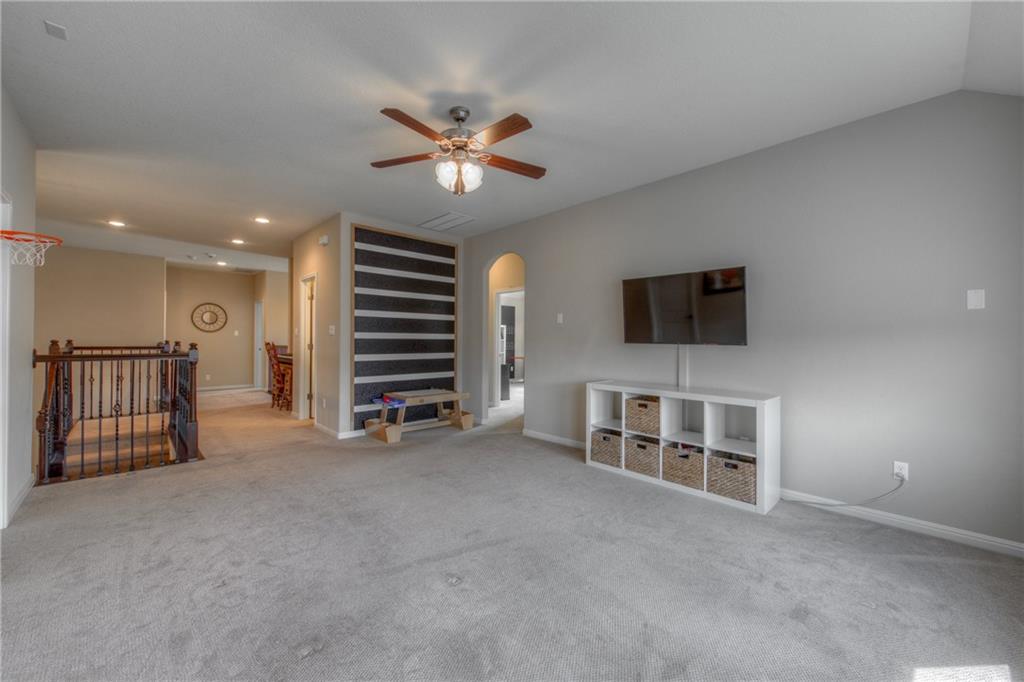 1511 Rimstone Drive Cedar Park, TX 78613 - Photo 23 of 40 a view of a livingroom with furniture and a ceiling fan