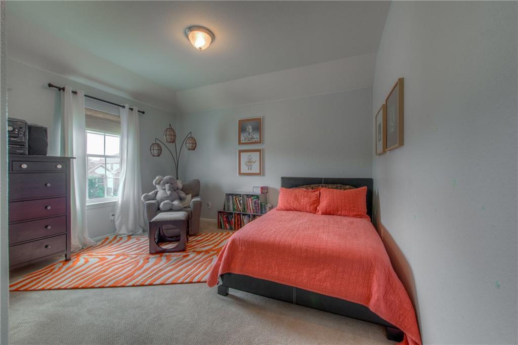 1511 Rimstone Drive Cedar Park, TX 78613 - Photo 24 of 40 a bed room with a bed and a window